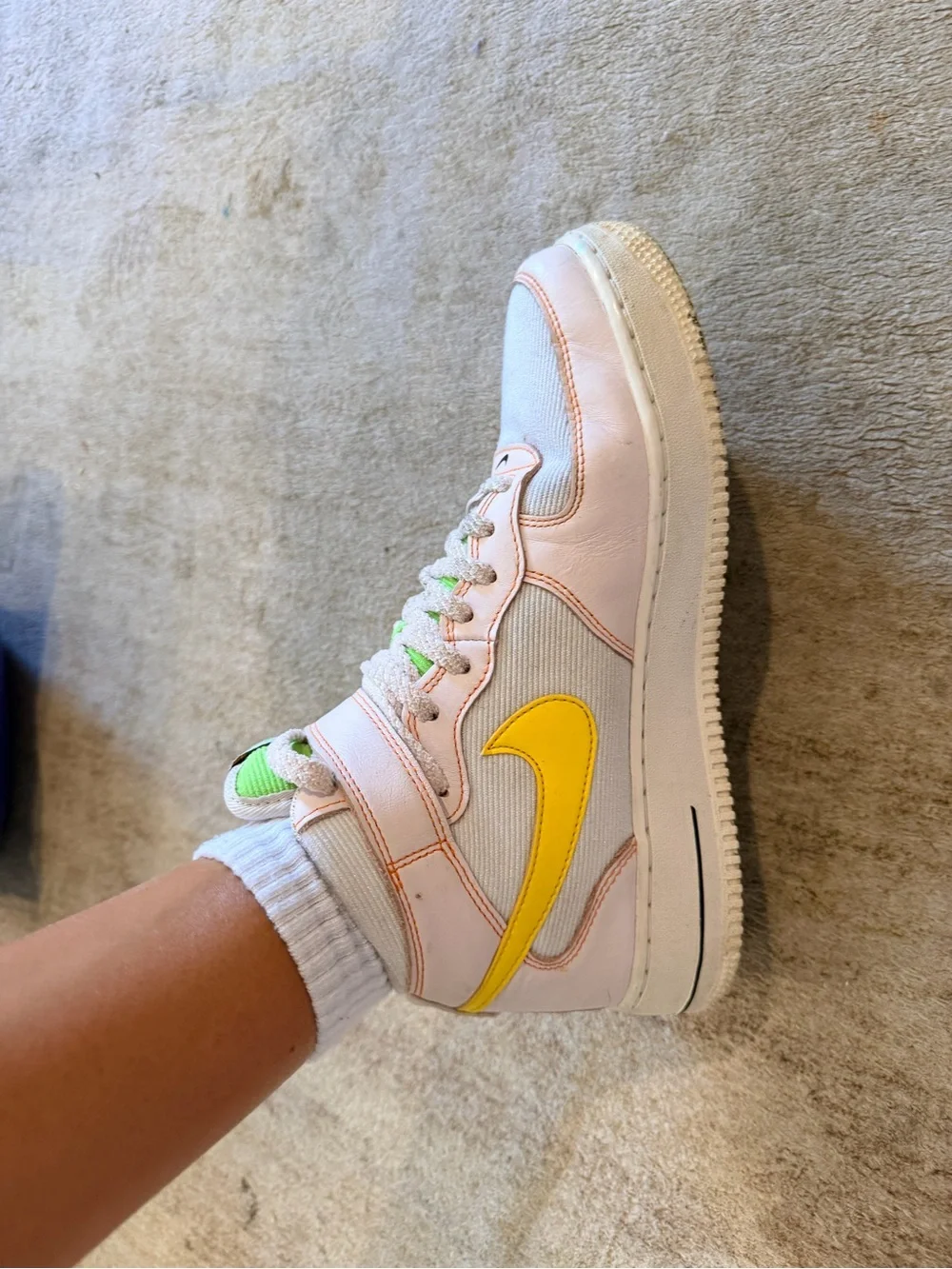 White High-Top Nike Sneakers with Neon Yellow Swoosh